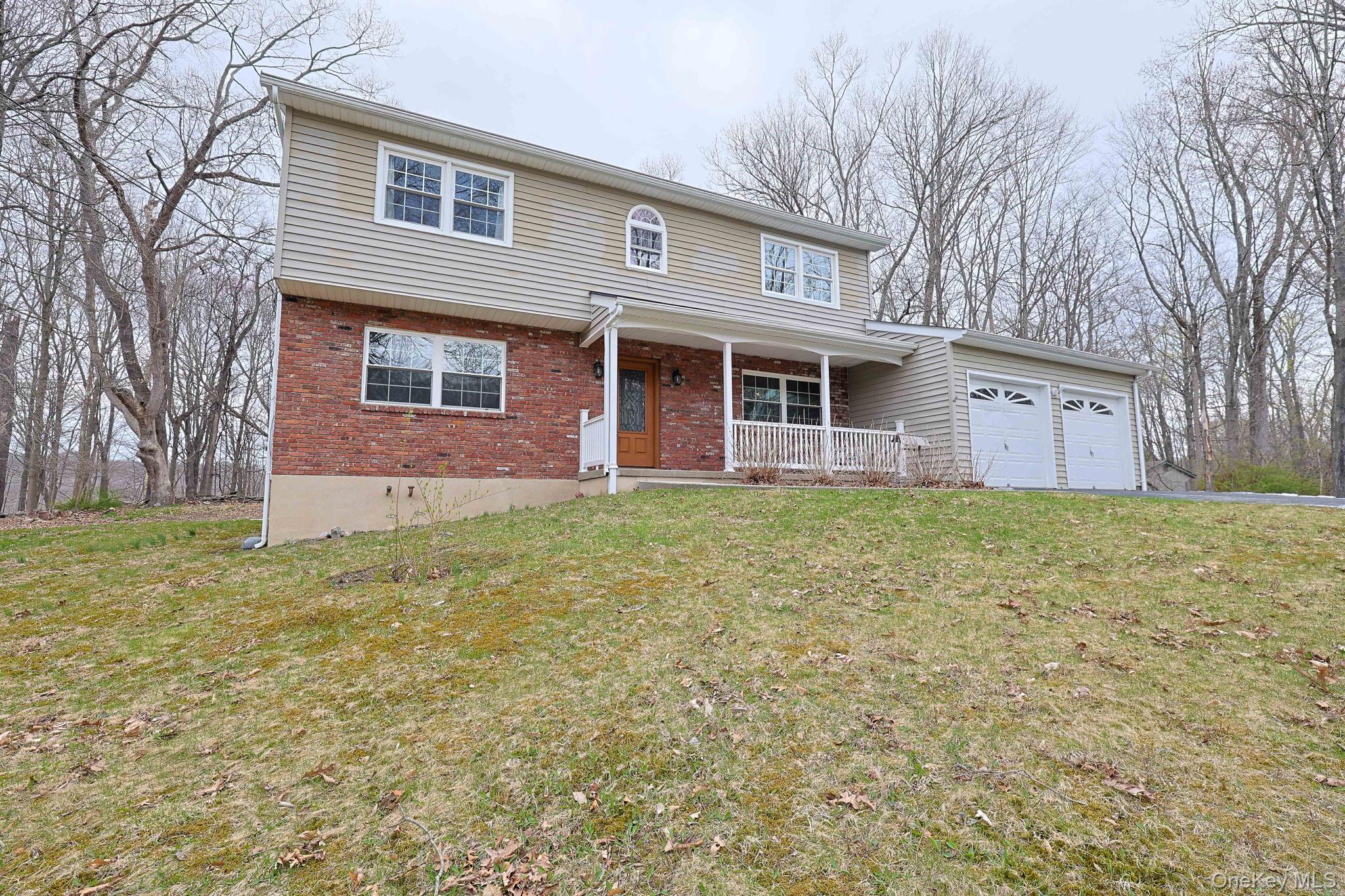 78 Pickerel Road Monroe, NY 10950 - Photo 34 of 41 a front view of a house with garden