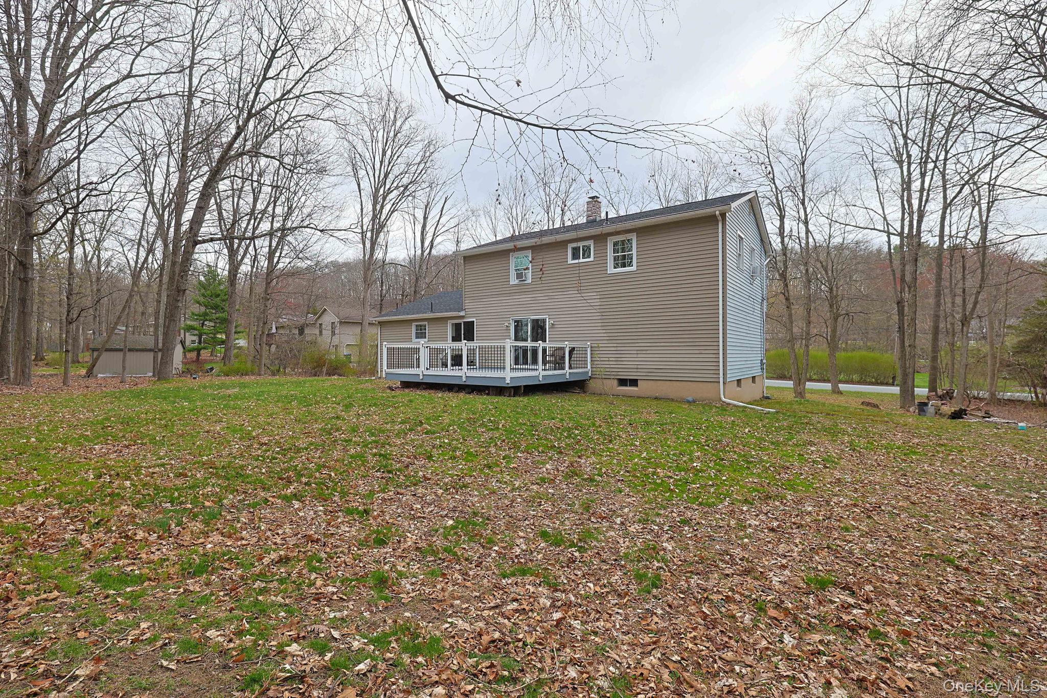 78 Pickerel Road Monroe, NY 10950 - Photo 41 of 41 a view of a house with backyard and trees