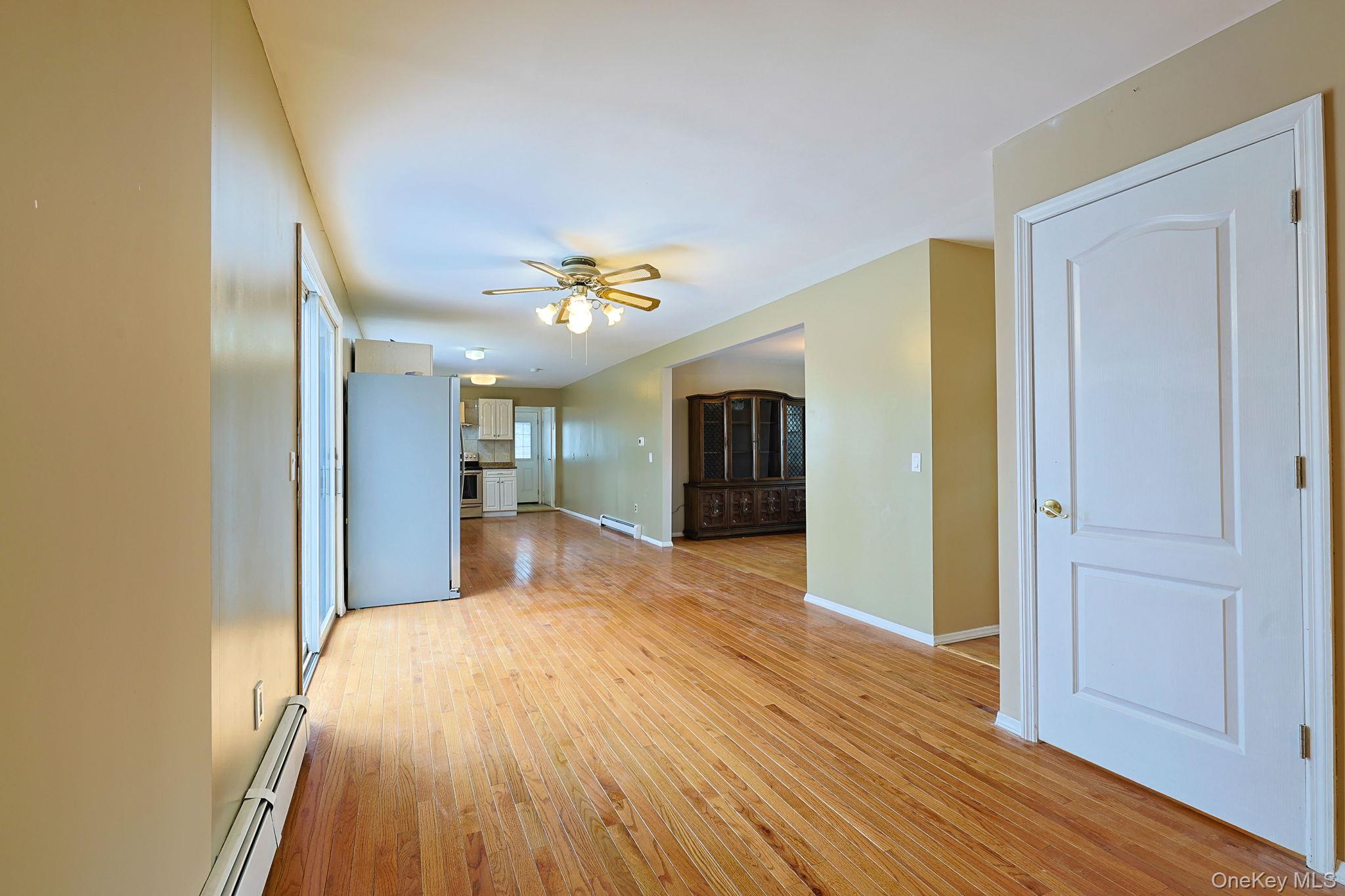 78 Pickerel Road Monroe, NY 10950 - Photo 8 of 41 a view of an empty room and wooden floor