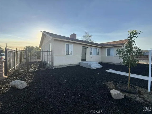 a view of backyard and porch