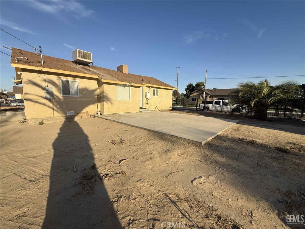214 Madison Street Bakersfield, CA 93307 - Photo 4 of 5 a view of a backyard of the house