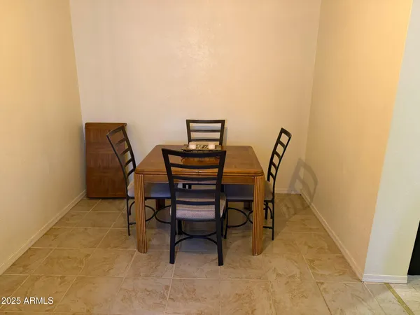 a view of a workspace with furniture