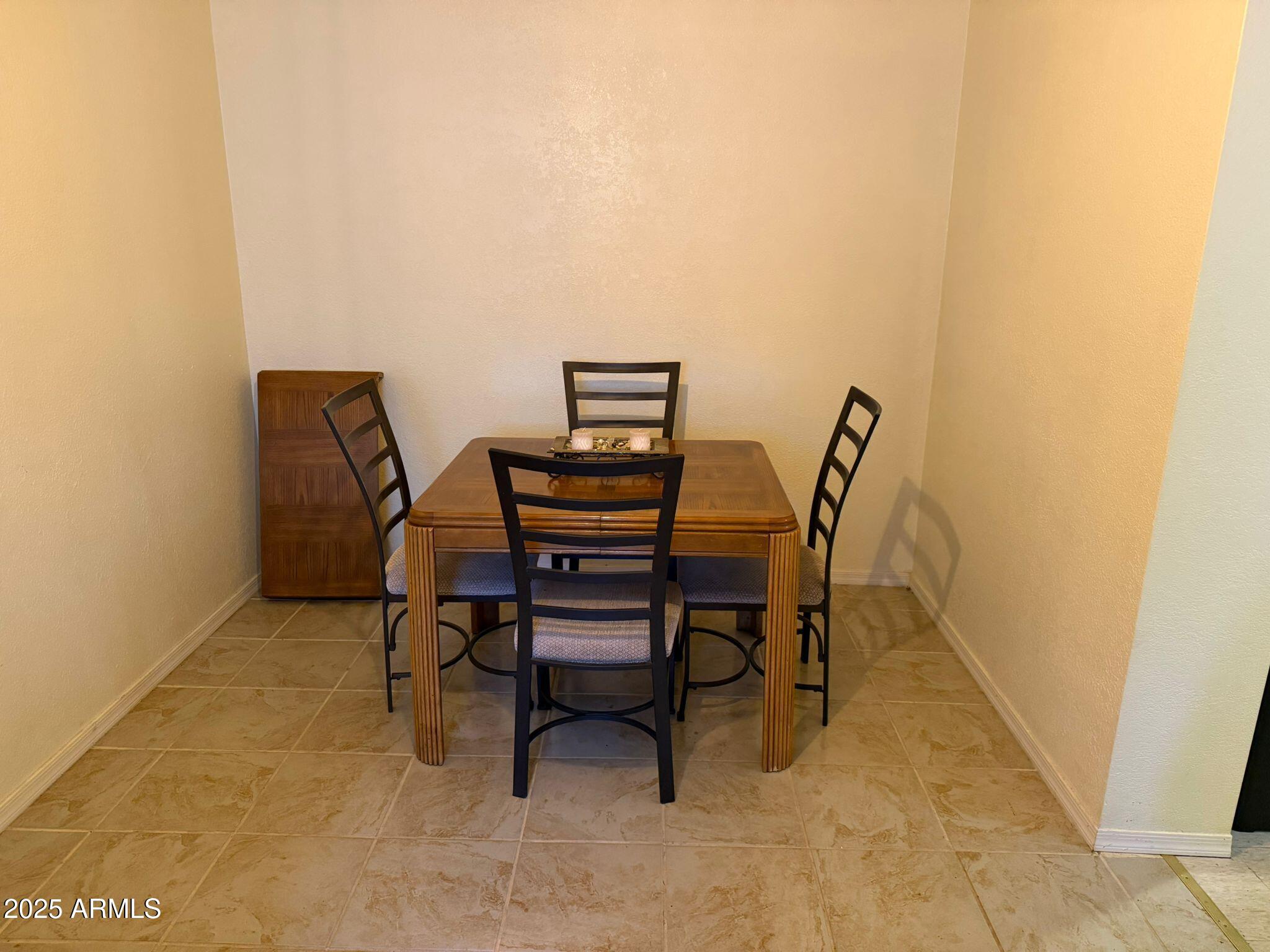 1249 East 10th Street, Unit REAR Douglas, AZ 85607 - Photo 4 of 10 a view of a workspace with furniture