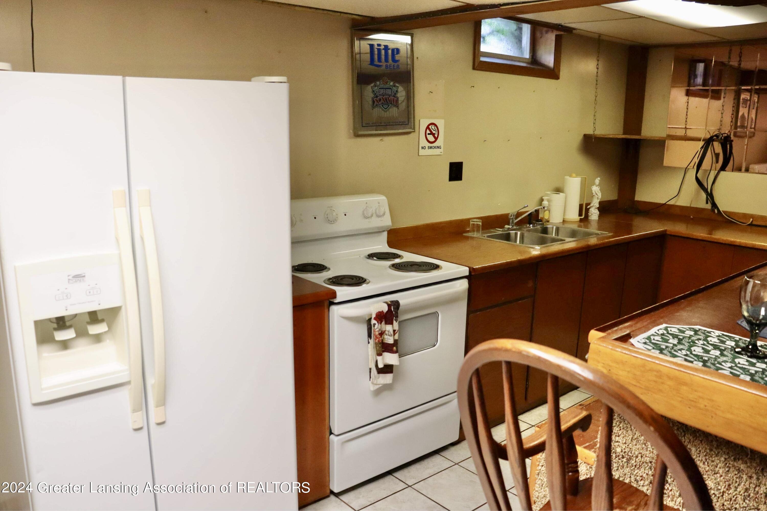 6794 East Colony Road Elsie, MI 48831 - Photo 34 of 47 Basement kitchen