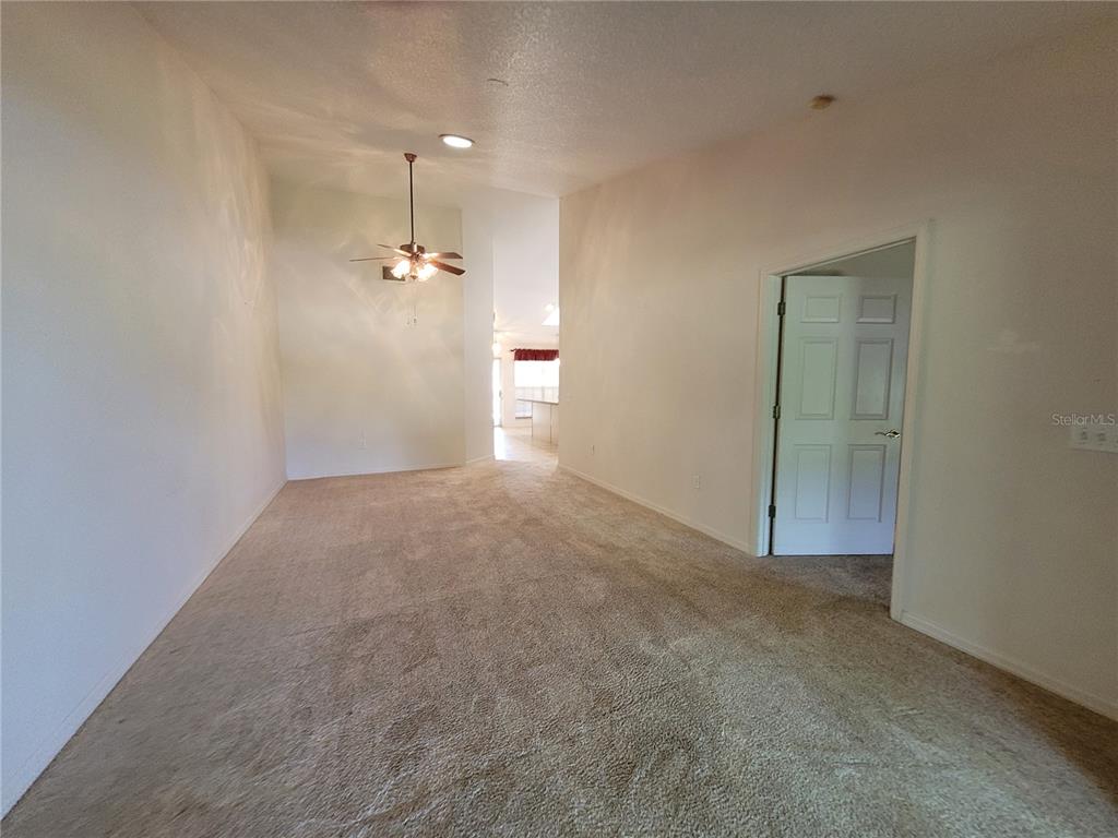 432 Baytree Boulevard Tavares, FL 32778 - Photo 16 of 65 a view of a room with an entryway