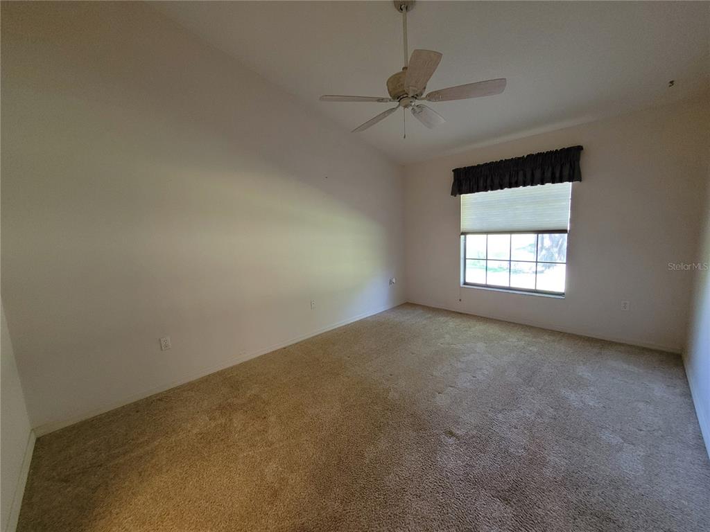 432 Baytree Boulevard Tavares, FL 32778 - Photo 19 of 65 an empty room with a window