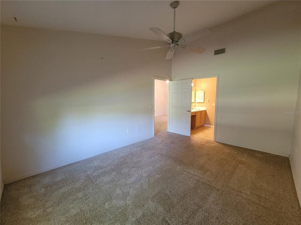 432 Baytree Boulevard Tavares, FL 32778 - Photo 20 of 65 a view of empty room with a fan