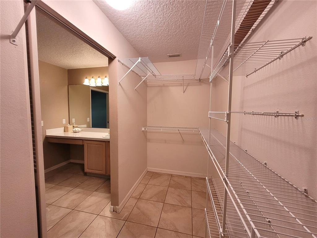 432 Baytree Boulevard Tavares, FL 32778 - Photo 24 of 65 a bathroom with a sink and mirror