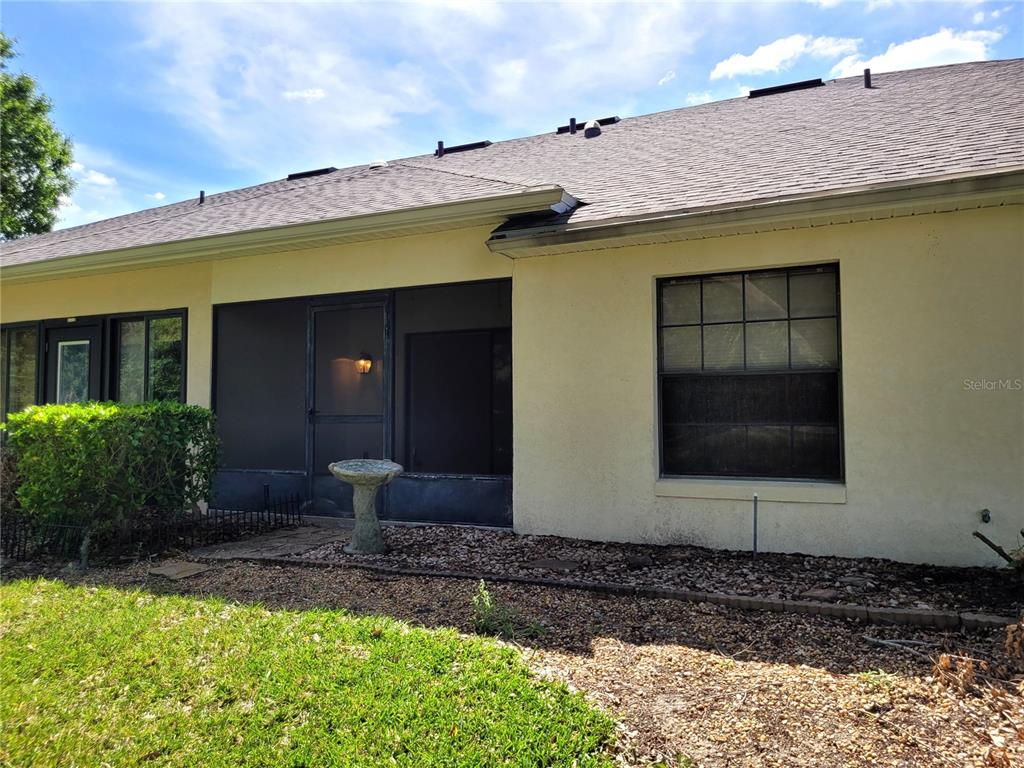 432 Baytree Boulevard Tavares, FL 32778 - Photo 35 of 65 a view of a house with a yard