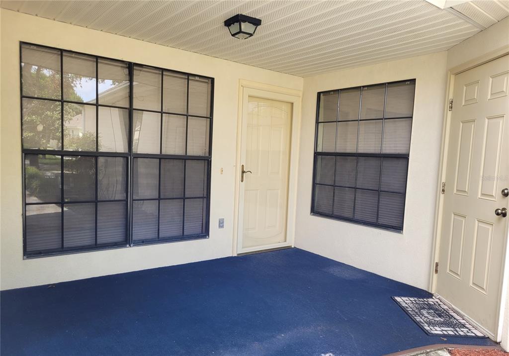 432 Baytree Boulevard Tavares, FL 32778 - Photo 5 of 65 an empty room with windows