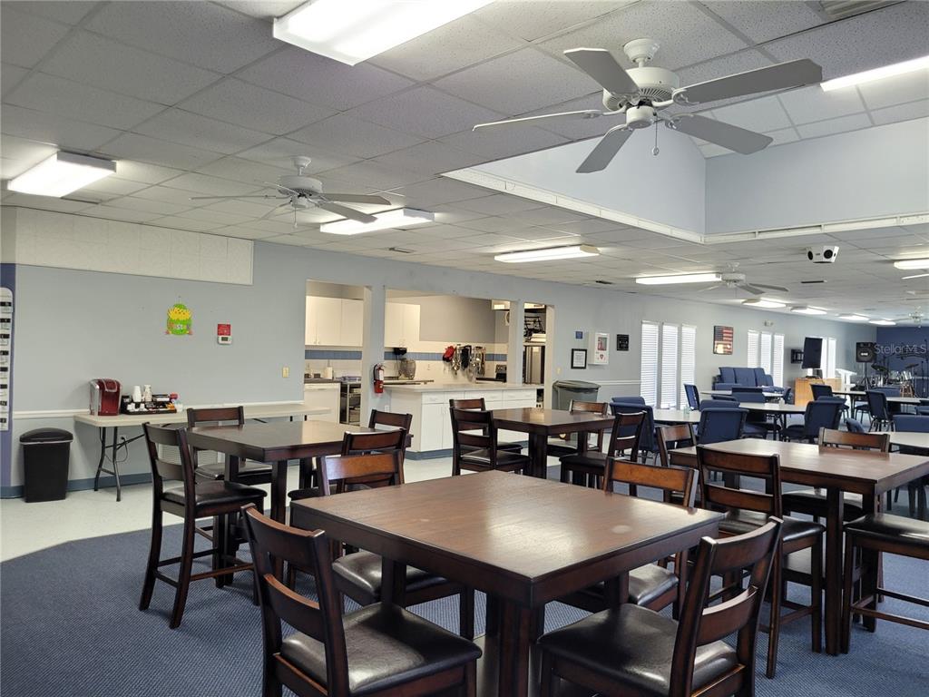 432 Baytree Boulevard Tavares, FL 32778 - Photo 58 of 65 a view of a dining area with furniture
