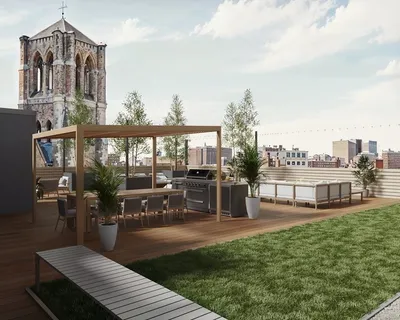 a view of a patio with couches and a table and chairs with garden in it