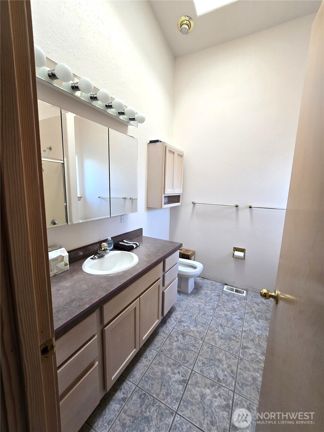 30100 H Street Ocean Park, WA 98640 - Photo 15 of 22 a bathroom with a sink and a mirror