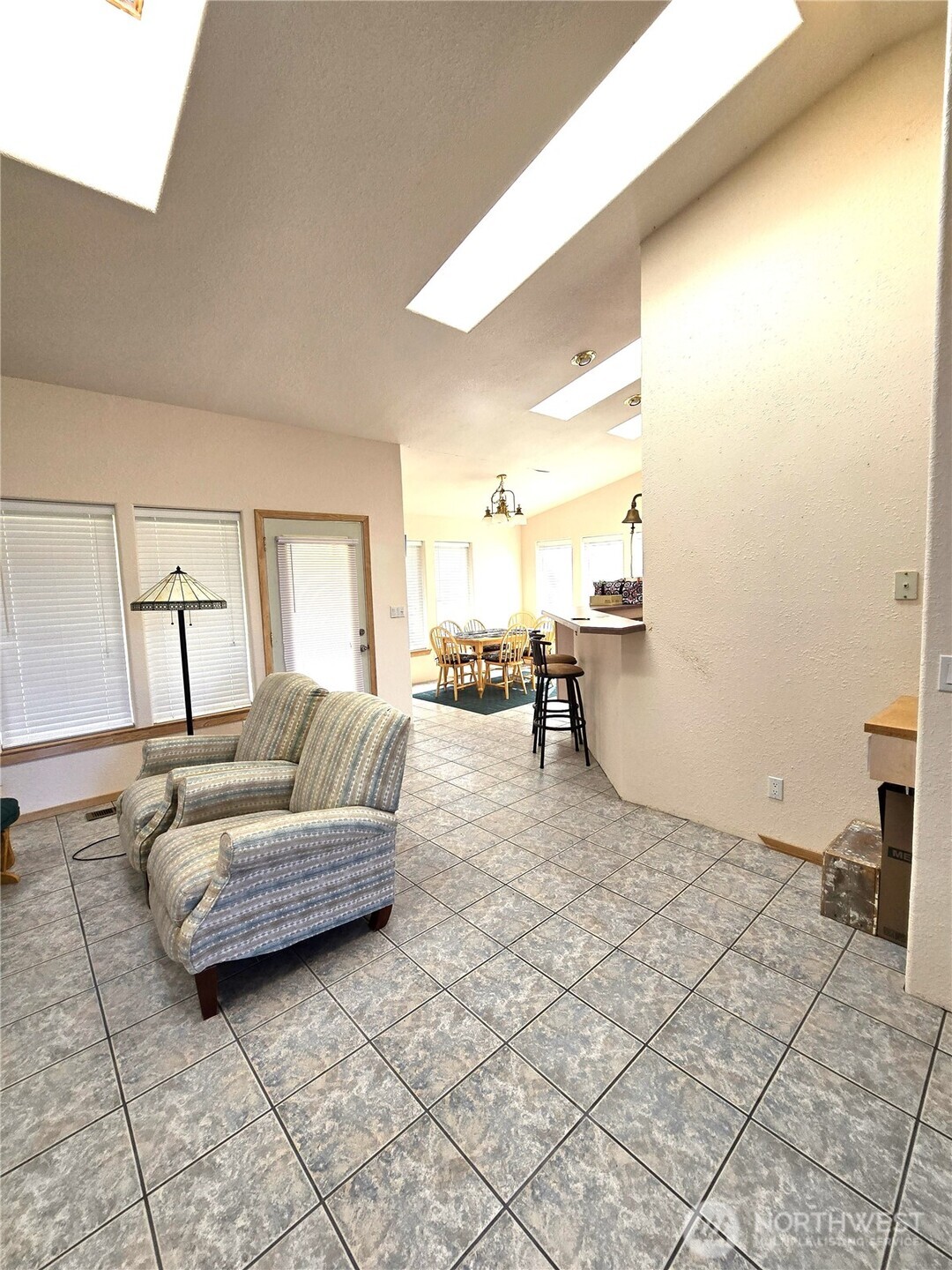 30100 H Street Ocean Park, WA 98640 - Photo 5 of 22 a living room with couches and kitchen view with wooden floor
