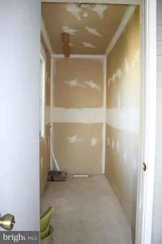 a view of a building with a yard