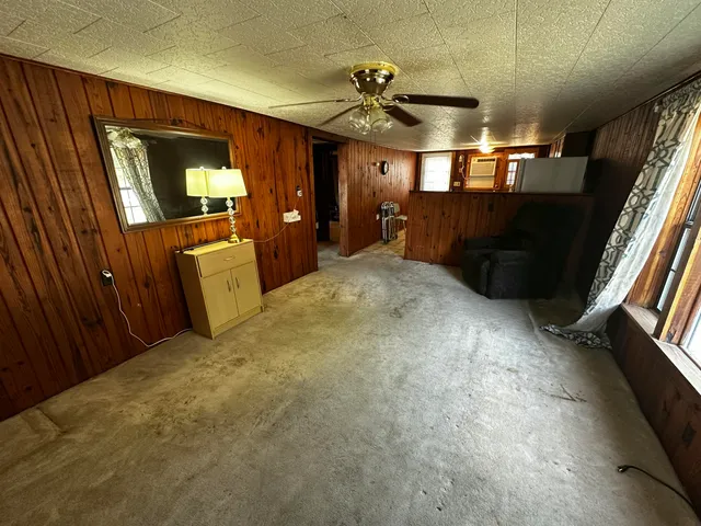 a view of a livingroom with furniture