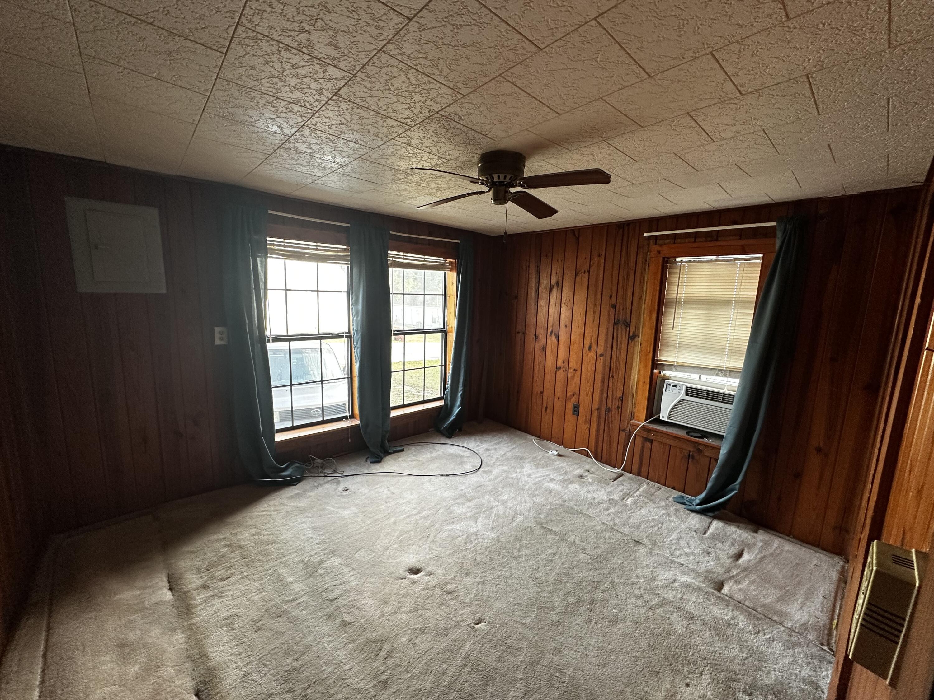 402 Church Street Crestview, FL 32539 - Photo 10 of 18 a view of an empty room with a window