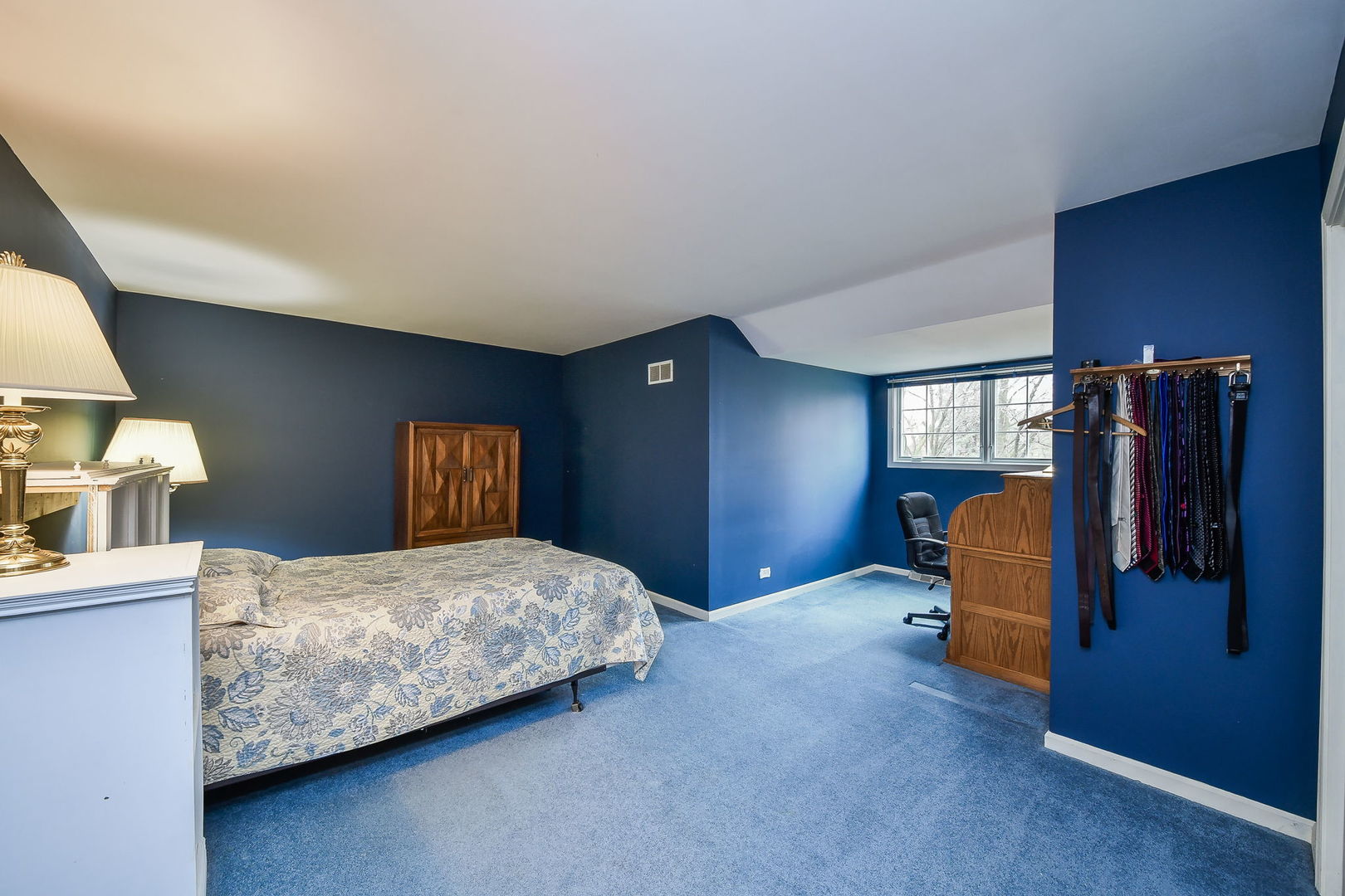 798 East Gartner Road Naperville, IL 60540 - Photo 21 of 36 a bedroom with a bed and wooden floor