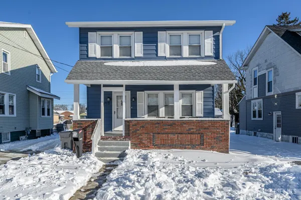 a view of a house with sitting area