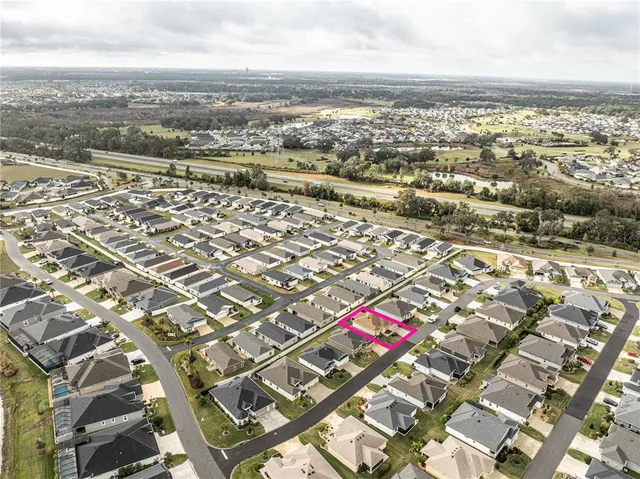 a view of backyard of a house