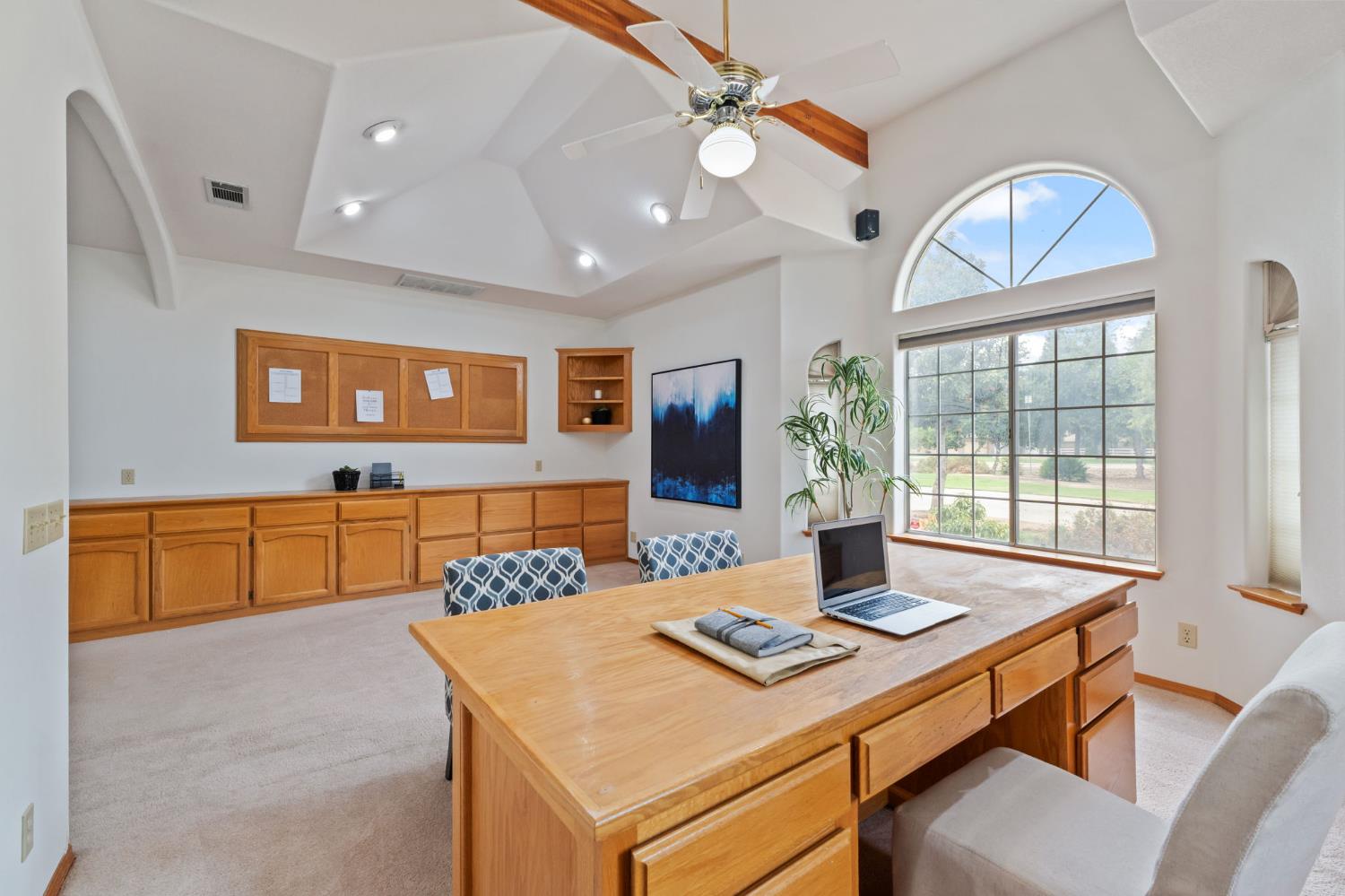 7357 East Dennett Avenue Fresno, CA 93737 - Photo 12 of 84 a view of a dining room with a table and chairs