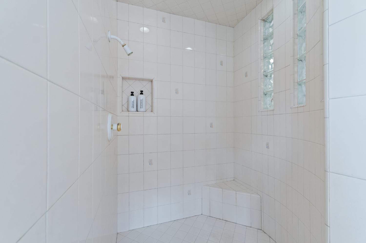 7357 East Dennett Avenue Fresno, CA 93737 - Photo 31 of 84 a bathroom with a shower