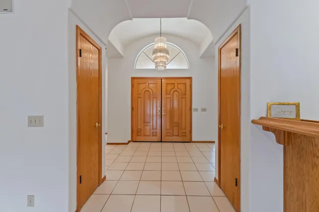 an aerial view of a house with a garden