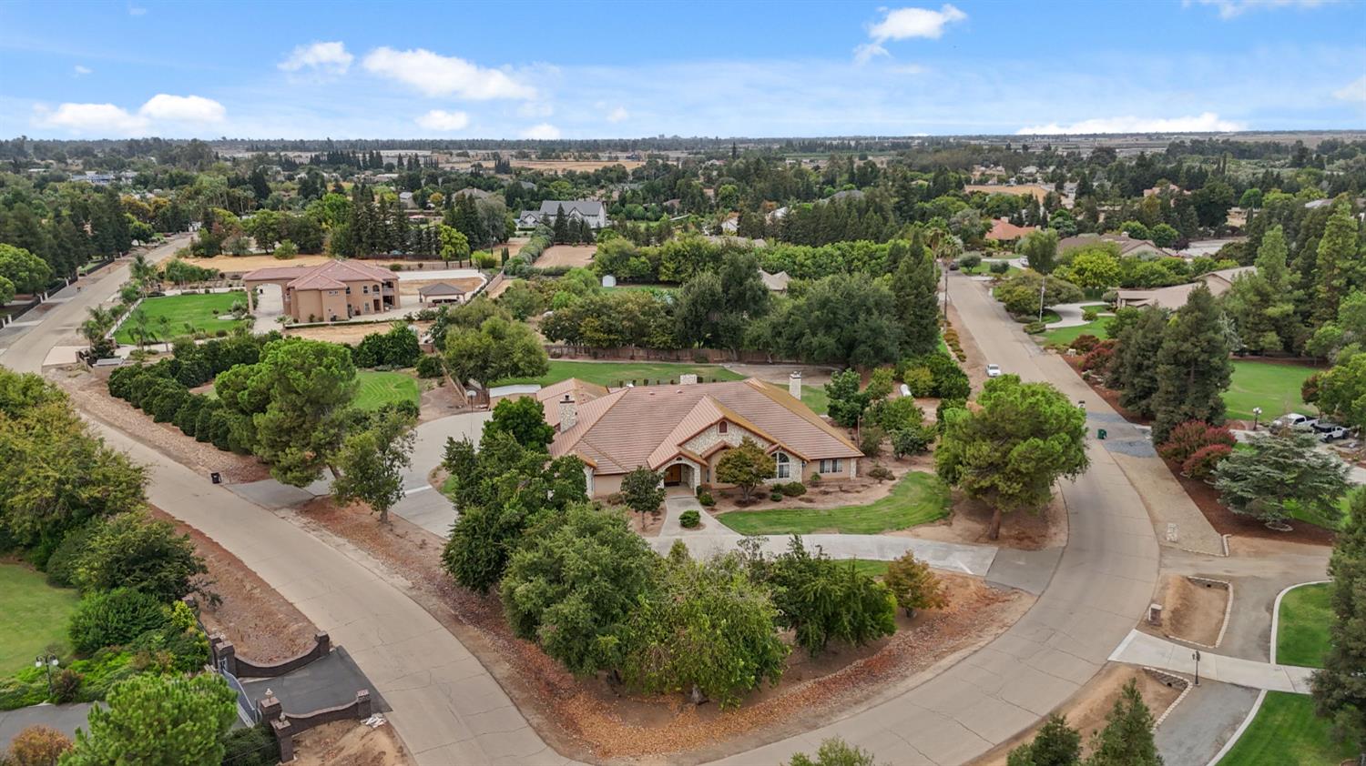 7357 East Dennett Avenue Fresno, CA 93737 - Photo 82 of 84 an aerial view of a house with a garden