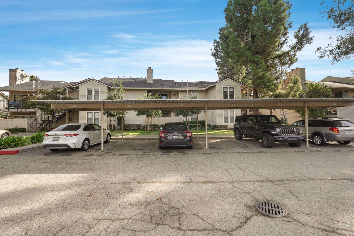 2401 Eilers Lane, Unit 304 Lodi, CA 95242 - Photo 20 of 21 a view of parking space with parked cars