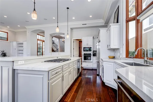 a view of a room that has a bed and a window
