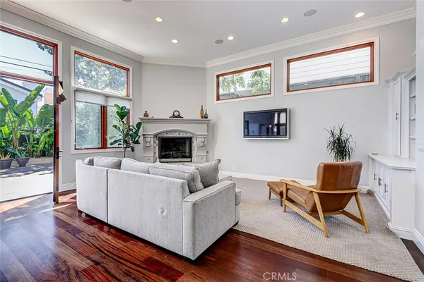a view of a brick building next to a yard