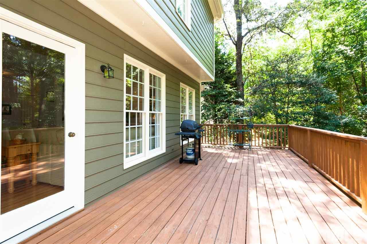 4124 Ridgebrook Bluffs Drive Raleigh, NC 27603 - Photo 22 of 24 Look at the size of that deck! Perfect for entertaining, relaxing or dining al-fresco.
