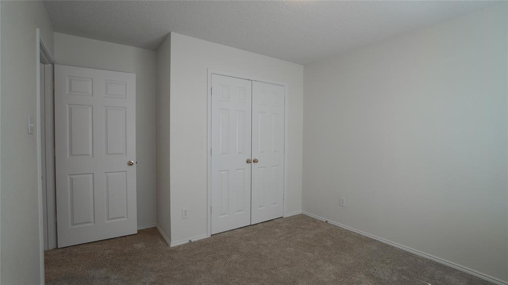 137 Magnolia Lane Rockwall, TX 75032 - Photo 25 of 28 a view of an empty room