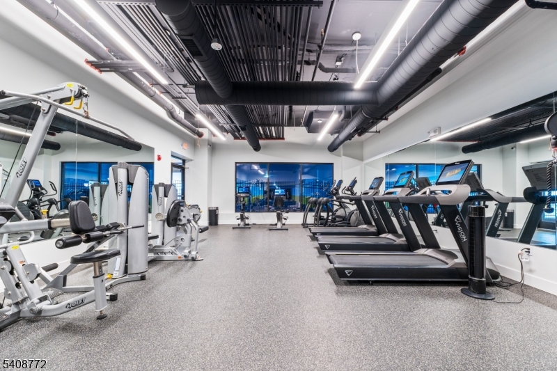 321 East 3rd Street, Unit 210 Plainfield, NJ 07060 - Photo 6 of 43 a view of a room with gym equipment