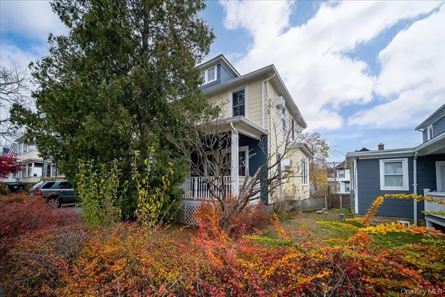 a picture of a room with black and white cabinet