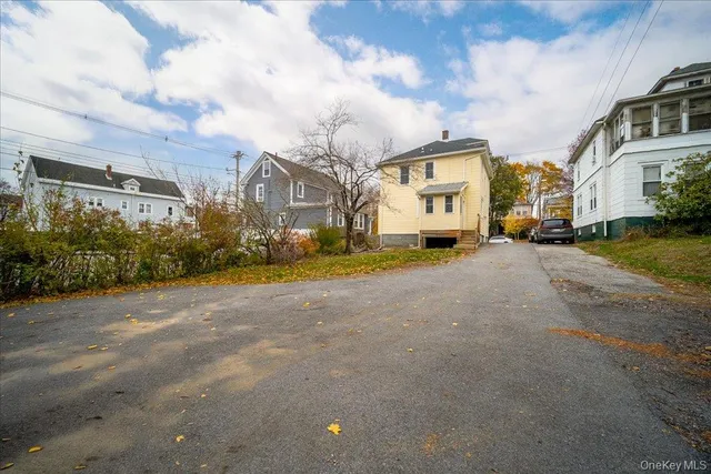 a view of empty room with wooden ceiling