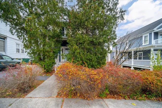 a view of a street with cars