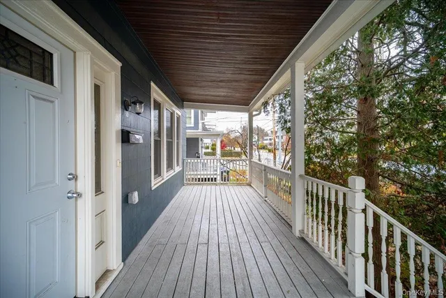 a backyard of a house with large trees