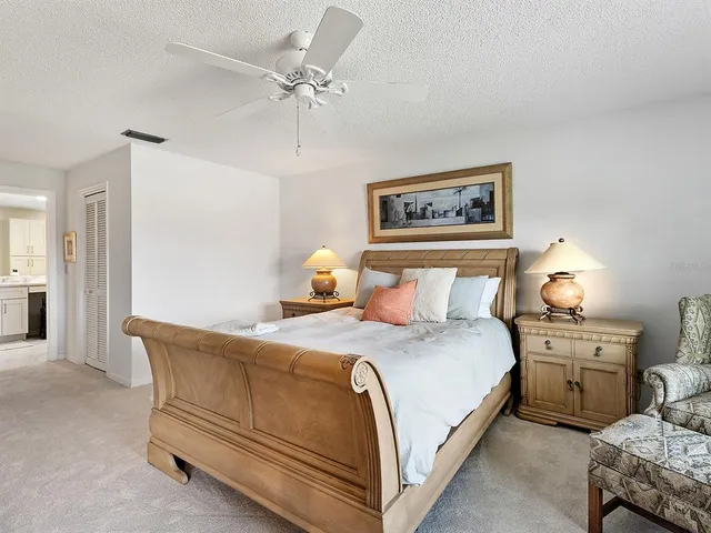 a kitchen with stainless steel appliances granite countertop a stove microwave and refrigerator