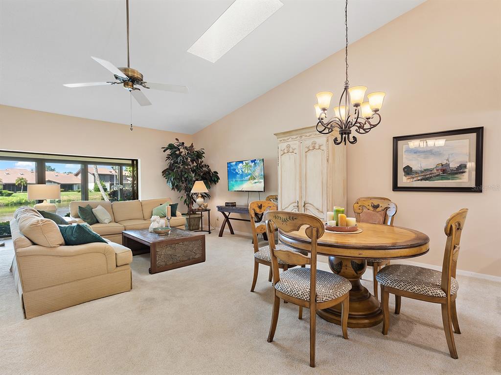 6094 Wilshire Boulevard, Unit 8 Sarasota, FL 34233 - Photo 24 of 42 a view of a livingroom and dining room