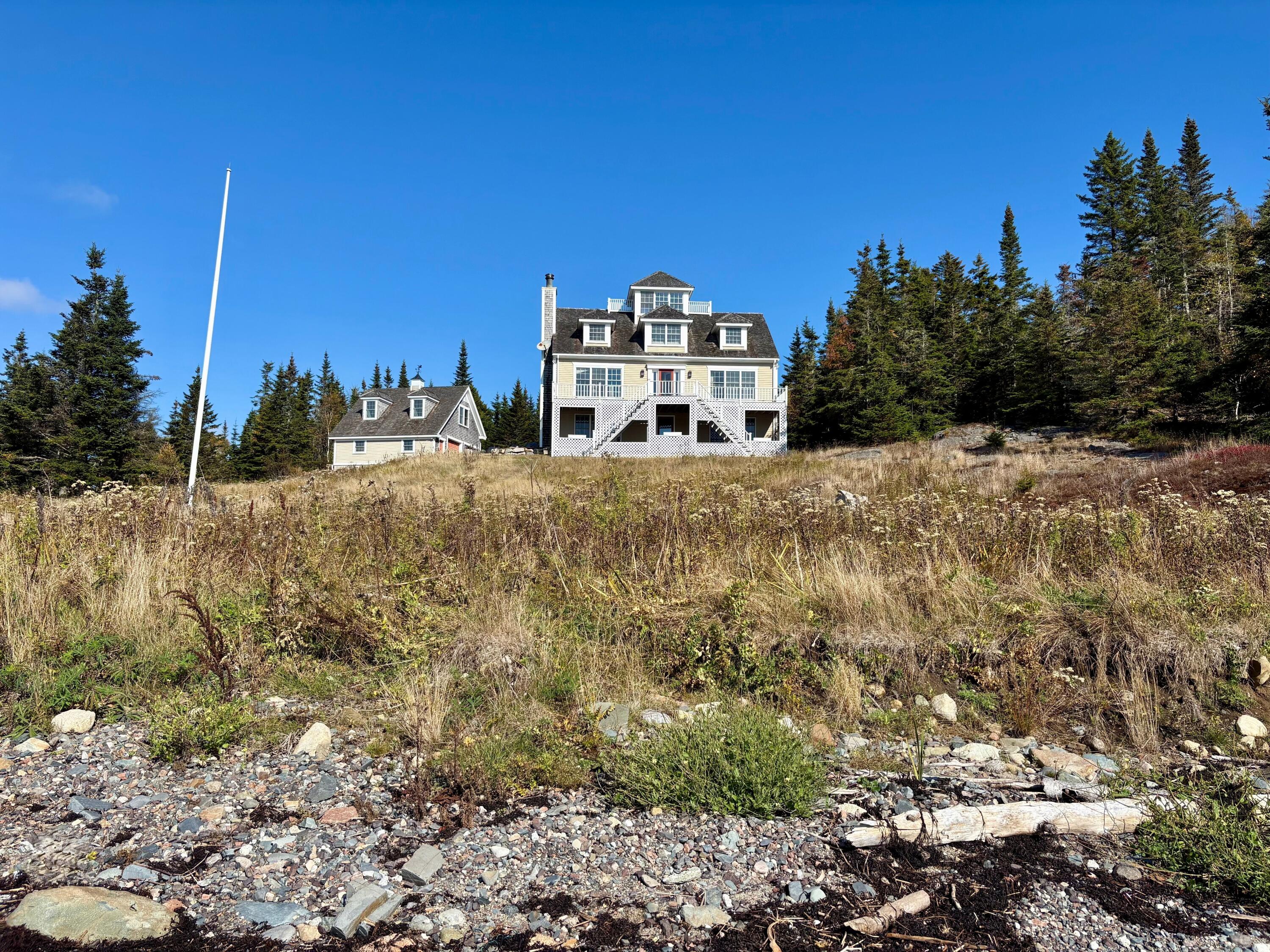 613 Yoho Head Road Machiasport, ME 04655 - Photo 60 of 97 Oceanside of Home & Garage from Beach