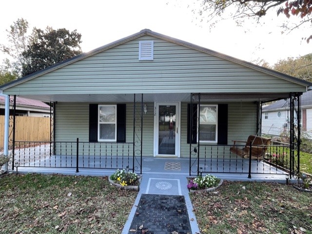 312 Gentry Street Tullahoma, TN 37388 - Photo 1 of 29 a front view of a house with garden