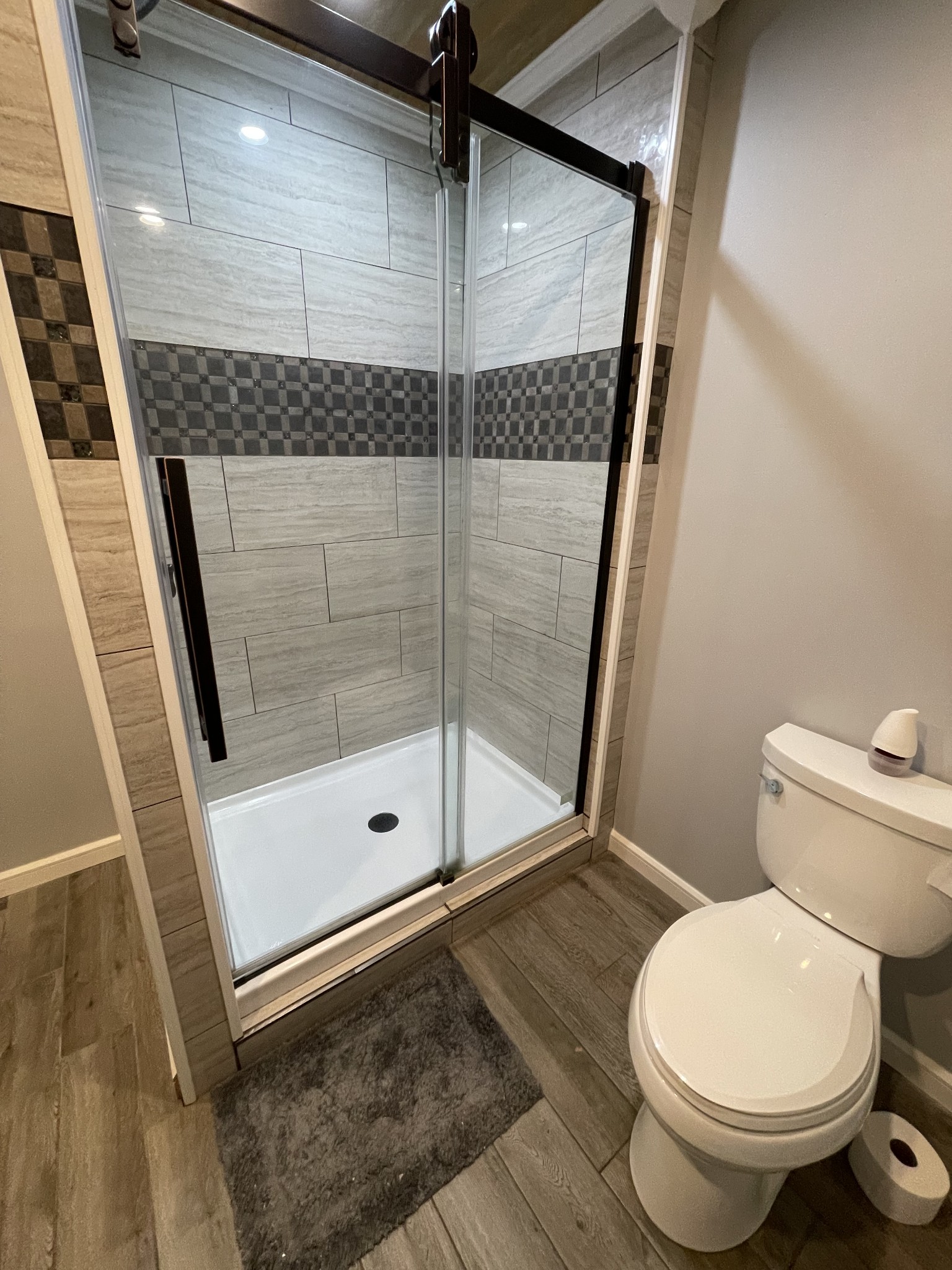 312 Gentry Street Tullahoma, TN 37388 - Photo 16 of 29 a bathroom with a shower and toilet
