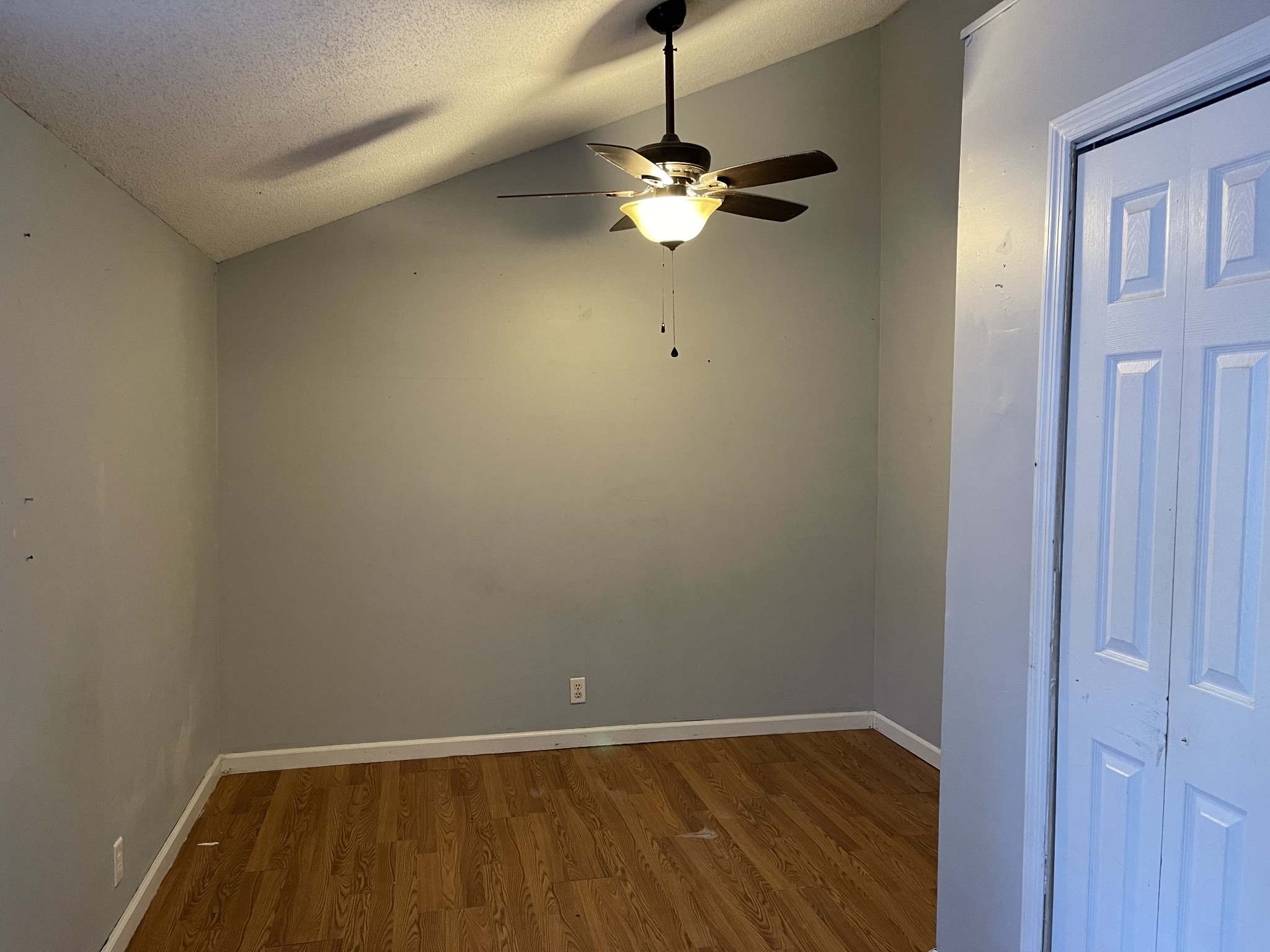 312 Gentry Street Tullahoma, TN 37388 - Photo 18 of 29 a view of an empty room with wooden floor