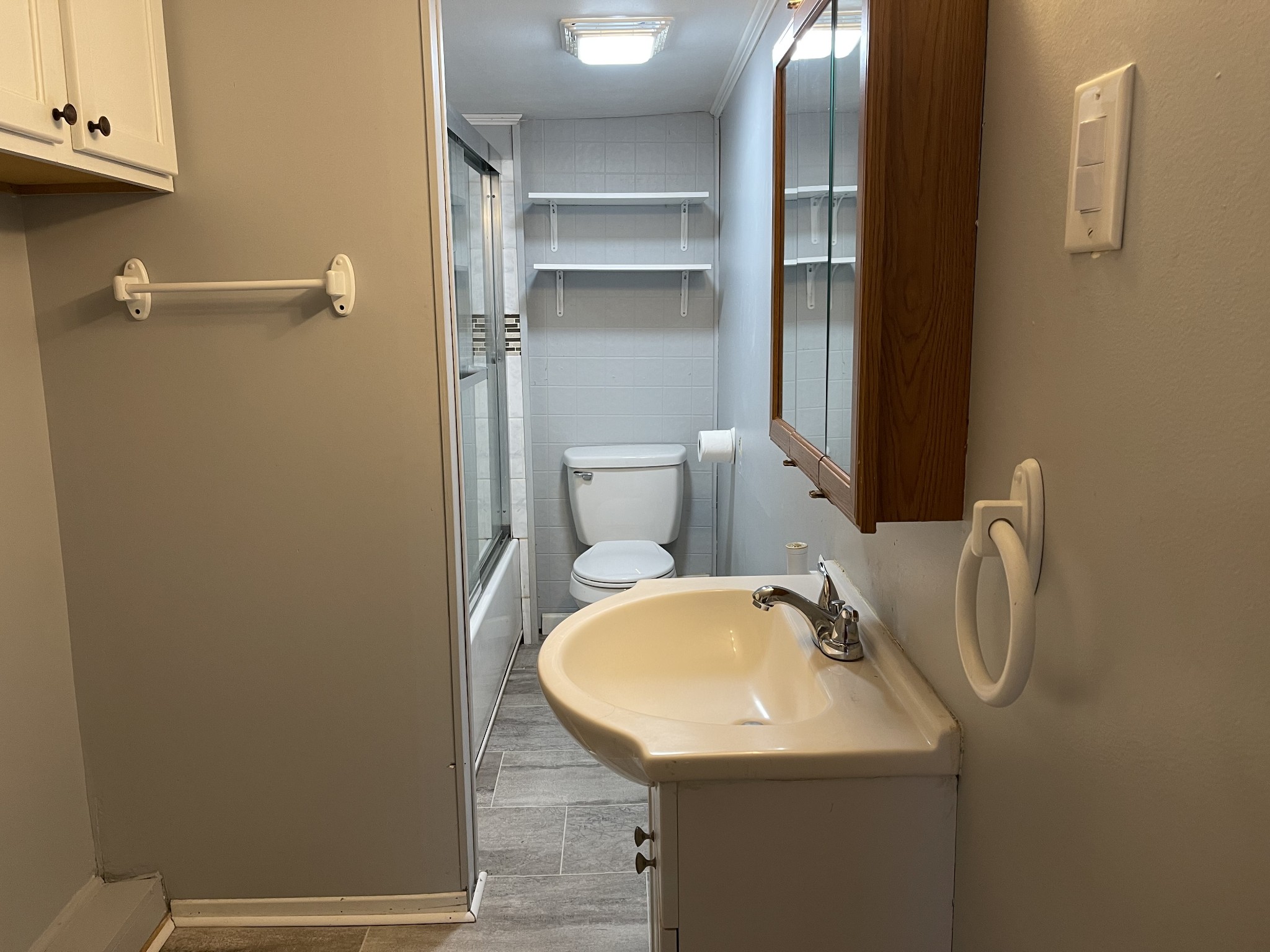 312 Gentry Street Tullahoma, TN 37388 - Photo 21 of 29 a bathroom with a sink and mirror