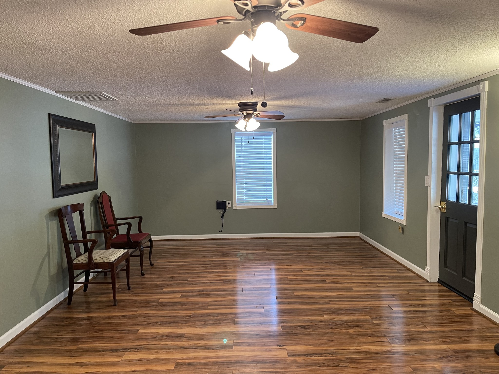 312 Gentry Street Tullahoma, TN 37388 - Photo 4 of 29 a view of empty room with wooden floor