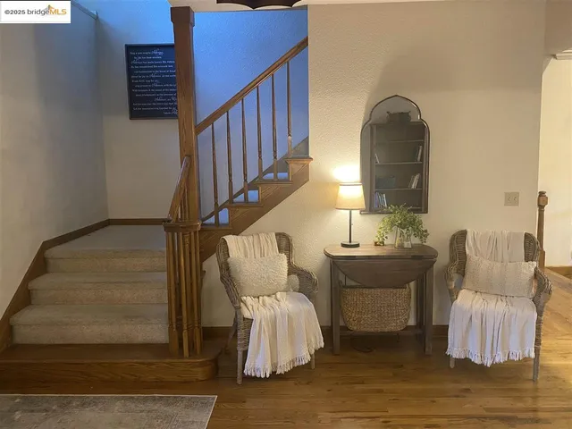 a bed room with furniture and a window