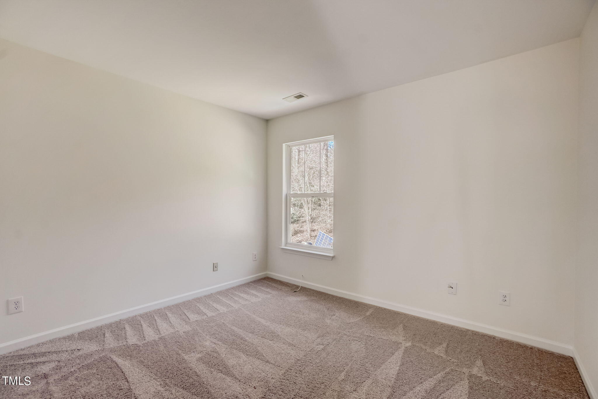 3705 Pinkham Way Raleigh, NC 27616 - Photo 17 of 29 a view of an empty room and window