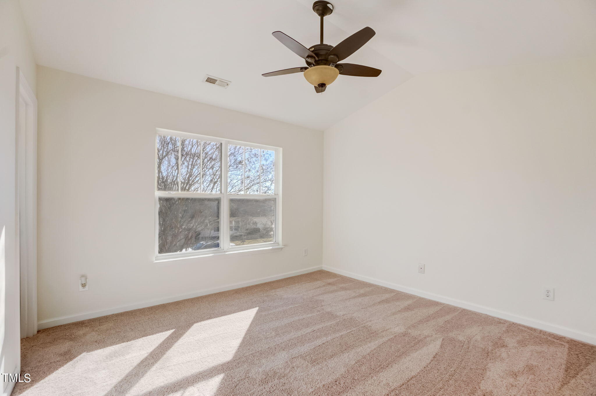 3705 Pinkham Way Raleigh, NC 27616 - Photo 21 of 29 an empty room with a window