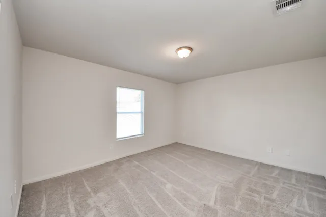 a bathroom with a granite countertop sink a toilet and bathtub